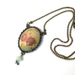 Michal Negrin Victorian-inspired floral and Swarovski crystal pendant necklace